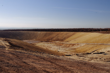 Garbage on the city landfill. Soil polution. Environmental protection. Extraction of biogas. Quarry...
