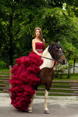 Gorgeous queen and her horse