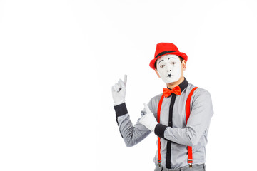 Portrait of a man, an artist, a pantomime. Shows something, isolated on white background