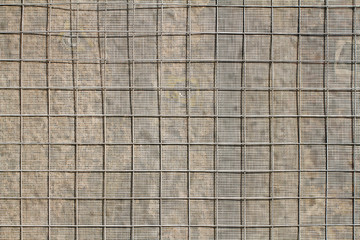 Background or texture of building metal and fabric mesh