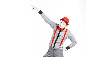 Portrait of a man, an artist, a pantomime. Shows something, isolated on white background