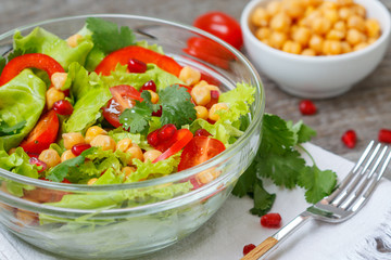 Healthy homemade vegan chickpea salad with vegetables. Love for a healthy vegan food concept