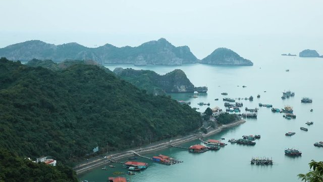 View of Ha Long Bay from the observation deck, Vietnam. Ha Long Bay is a UNESCO World Heritage Site and popular travel destination. Full HD stock footage. 
