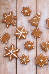 Fototapeta na wymiar Gingerbread christmas cookies on wooden background