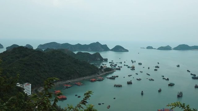 Pan Timelapse of Ha Long Bay from the observation deck, Vietnam. Ha Long Bay is a UNESCO World Heritage Site and popular travel destination. Full HD stock footage. 
