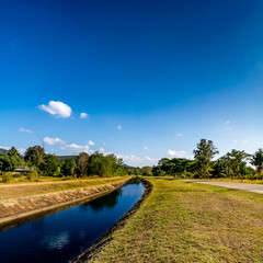 Fototapeta na wymiar waterway canal with blue sky