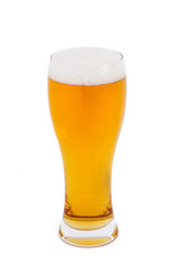 Lager beer in a glass isolated on white background