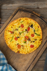 pizza top view in rustic setting