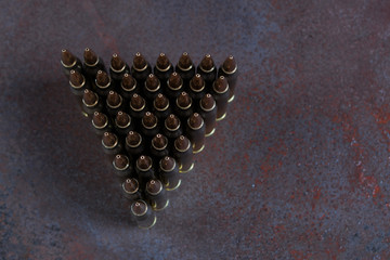 Group of  ammunition geometrically placed in rows