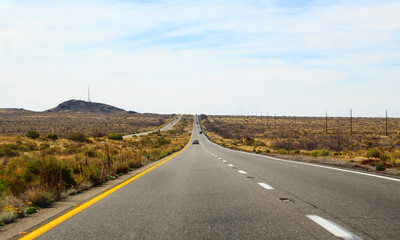 Fototapeta premium Long road through the desert