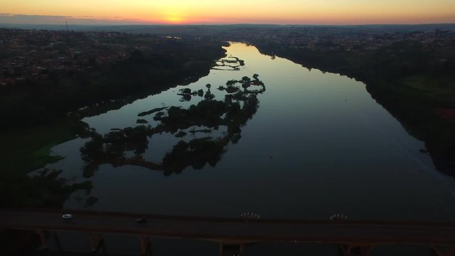 Aerial footage River at sunset in Barra Bonita city in Sao Paulo state - Brazil. July, 2016.