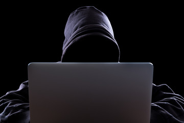 Anonymous hacker in the dark