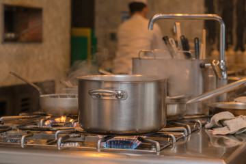 steam on pot in kitchen