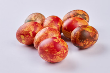 Colored chicken eggs. Easter eggs close up. Symbol of old Christian holiday.