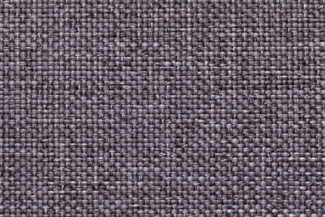 Gray background with braided checkered pattern, closeup. Texture of the weaving fabric, macro.