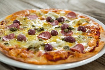 Bread dough ball on a wooden tray