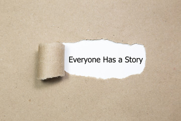 Everyone Has a Story written under torn paper