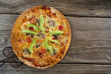 Italian pizza on a wooden plank