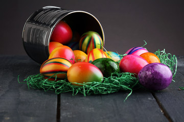 Row of Easter eggs on wooden table