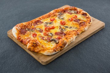 Italian pizza on a chopping board
