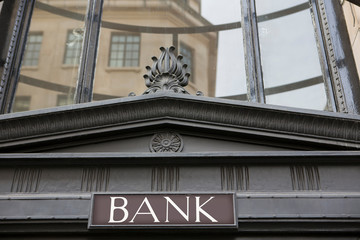 Sign On Exterior Of Bank Building