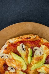 Italian pizza served in a pizza tray