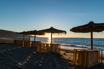 sunset over a sunny beach