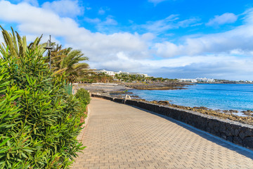 Coastal promenade in Playa Blanca holiday village, Lanzarote island, Spain