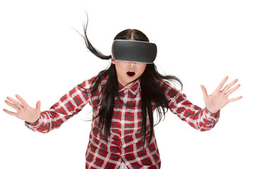 Shocked woman in VR playing and traveling in cyberspace.
