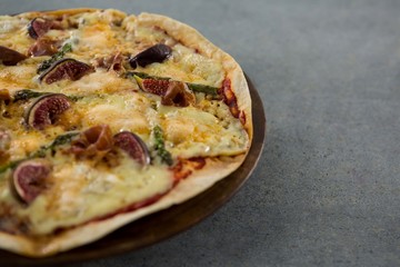 Italian pizza served on a pizza tray