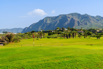 Green lawn of a golf course in nothern part of Tenerife island, Spain