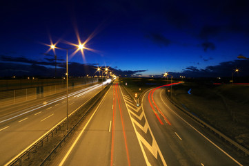 Fototapeta na wymiar Skyline of car lights at night