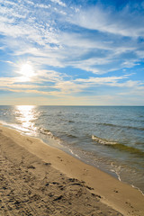 Sun over beautiful sea and beach in Debki village, Baltic Sea, Poland