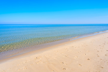 Crystal clear calm sea water on Lubiatowo beach, Baltic Sea, Poland