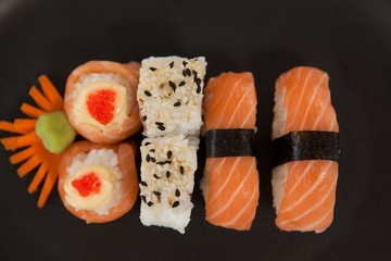 Maki, uramaki and nigiri sushi served in plate 