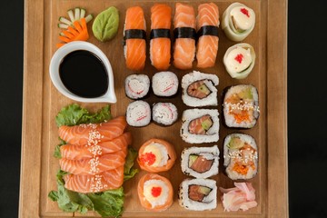Assorted sushi set served on wooden tray