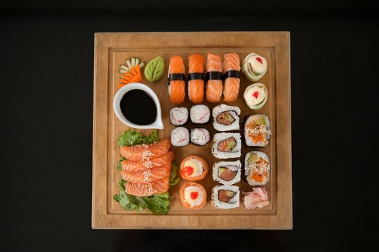 Assorted sushi set served on wooden tray