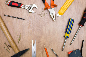 hammer, screwdriver, scissors on the table. Tools for repair