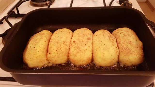 Appetizing cutlets from potato stuffed with mushrooms are fried in vegetable oil