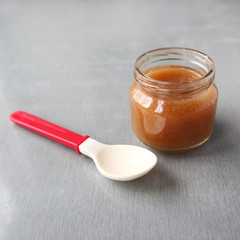 Organic baby food. Puree with apple