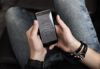 Top View Mockup of a Smartphone in User's Hands 1