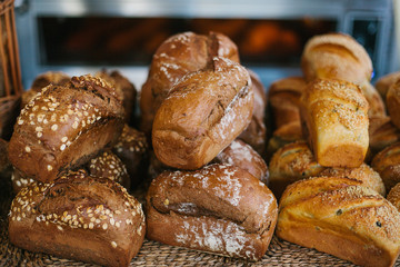 Fresh bread from cereals with seeds from a bakery. Healthy and nutritious food. The product contains carbohydrates.