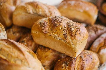 Fresh bread from cereals with seeds from a bakery. Healthy and nutritious food. The product contains carbohydrates.