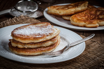 Polish pancakes with powdered sugar.