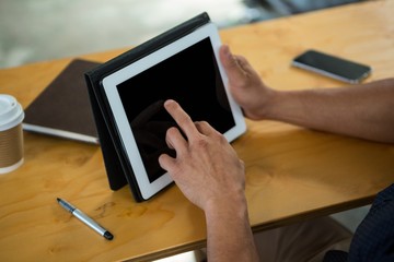 Fototapeta na wymiar Business executive using digital tablet