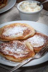 Polish pancakes with powdered sugar.