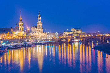 Fototapeta na wymiar View of Cathedral of the Holy Trinity or Hofkirche, Bruehl's Terrace or The Balcony of Europe.Elbe river in Dresden, Saxony, Germany, Europe.