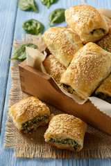 Puff pastry rolls  with spinach and ricotta.
