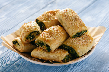 Puff pastry rolls  with spinach and ricotta.
