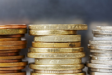 Coins against dark silver background